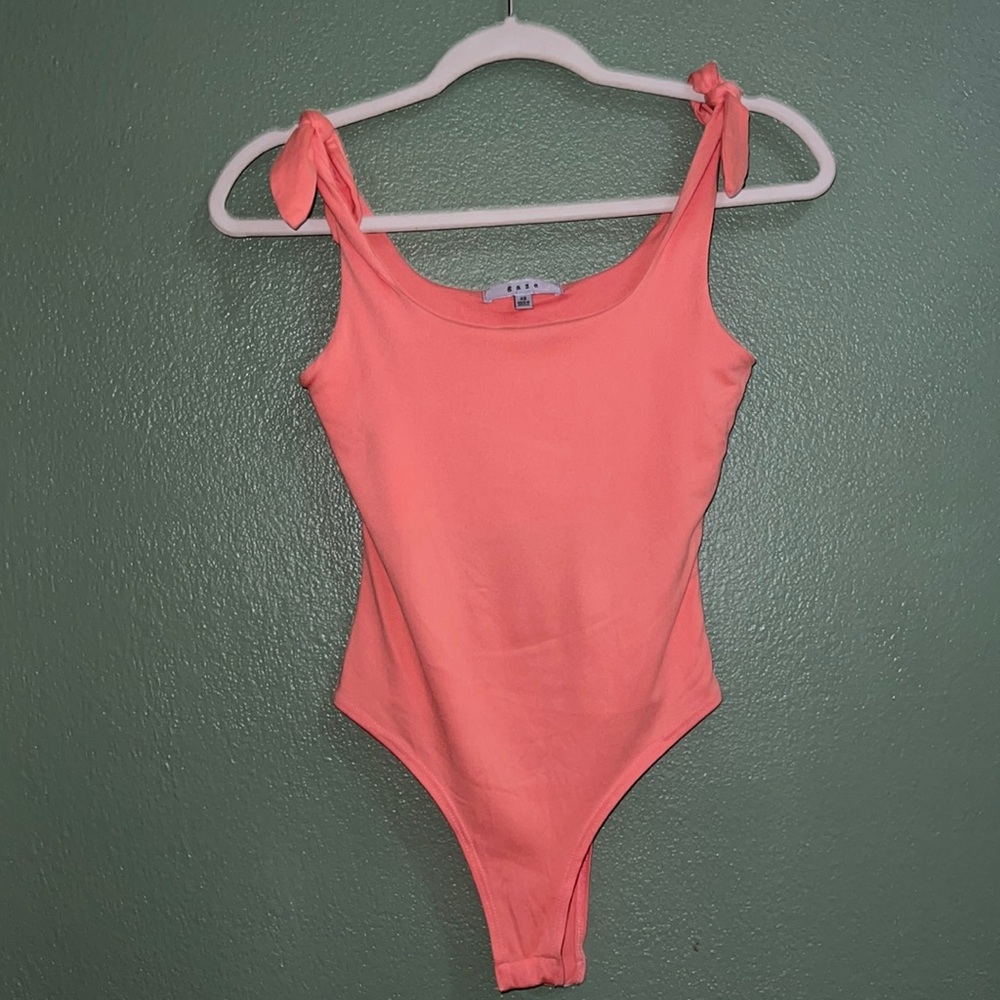 coral pink bodysuit with bows
